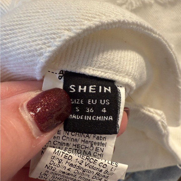 Ripped Raw Hem White Denim Shorts - Picture 5 of 5